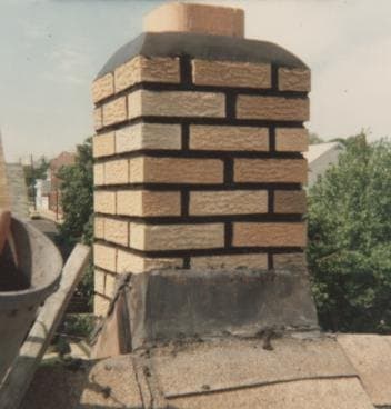 After: a newly rebuilt brick chimney