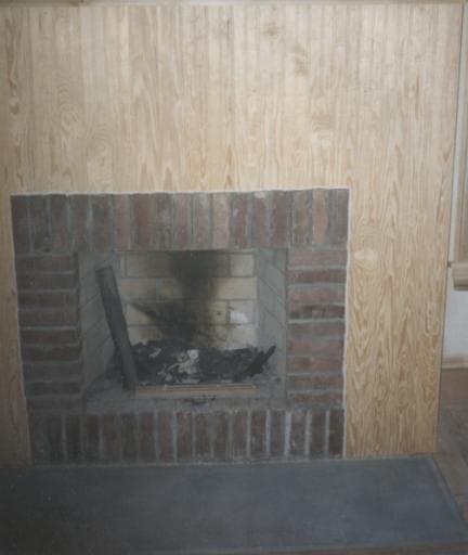 Finished rebuilt brick fireplace and firebox